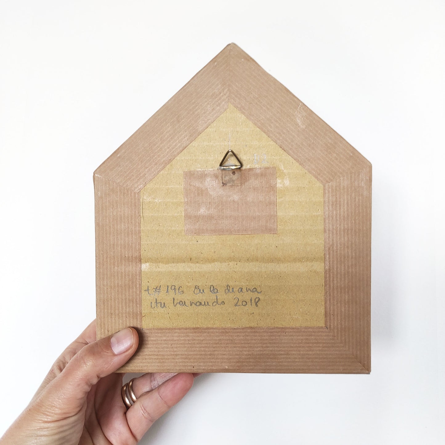 Vista trasera caja pop-up tridimensional En la diana