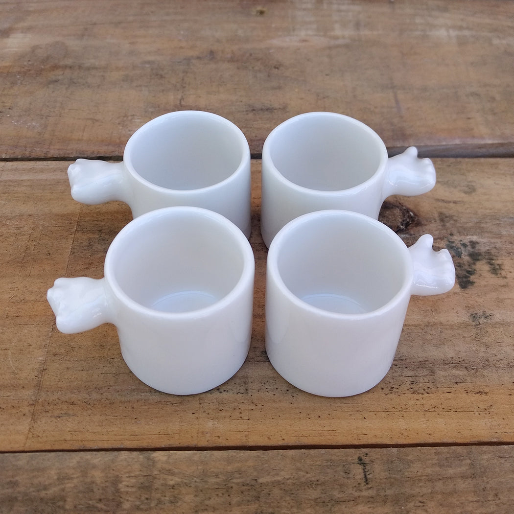 Conjunto de vasos chupito loza esmaltada con manos decorativas