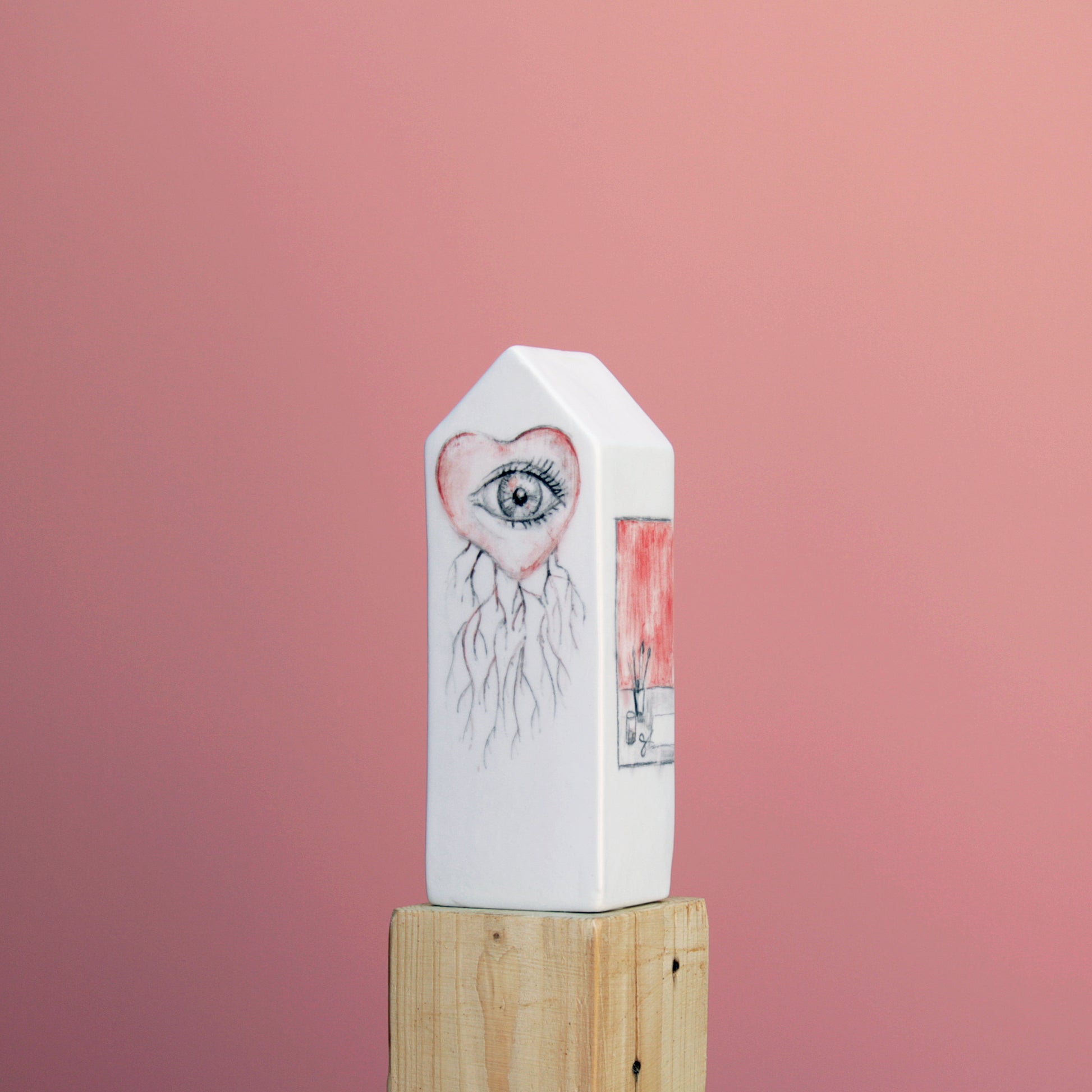 Escultura cerámica Desde mi taller pieza única vista corazón ojo