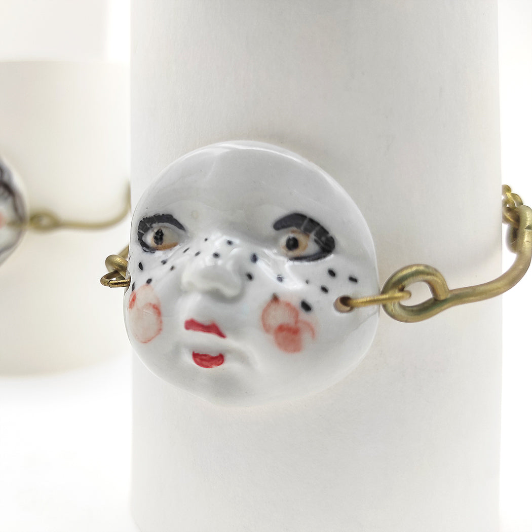 Pulsera ajustable caritas ojos negros con motivos pintado a mano porcelana